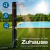 An outdoor shower next to a swimming pool on a sunny day. Produktbild-Vorschau