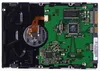 The image shows the internal components of a hard disk drive, specifically the printed circuit board and motor assembly. Produktbild-Vorschau