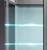An open modern display cabinet with glass shelves illuminated by blue LED lights. Produktbild-Vorschau