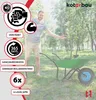 A man is standing next to a green wheelbarrow in a grassy outdoor setting. Voir les images du produit