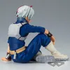 A figurine of a character from My Hero Academia sitting down, viewed from the side. Produktbild-Vorschau