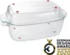 A clear glass baking dish with a lid, shown from a slightly elevated side angle. It has red dots on the lid and inside the dish. A 'German Design Award Winner 2020' badge is in the bottom right corner. Voir les images du produit