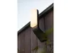 A modern outdoor wall light mounted on a wooden fence. Produktbild-Vorschau