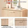 A collage showing a wooden cabinet with decorative panels and a handle, along with close-up views of its features. Voir les images du produit
