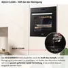 A built-in oven is shown in a kitchen setting, with a close-up inset demonstrating the Aqua Clean feature. Produktbild-Vorschau