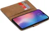 A brown book-style phone case with credit card slots, open to reveal a smartphone with a colorful wallpaper. Produktbild-Vorschau