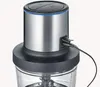 Close-up shot of the top part of a cordless food processor, showing the charging port with a cable plugged in. Produktbild-Vorschau