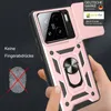 A hand holding a rose gold phone case with a camera protector and ring holder. Produktbild-Vorschau