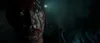 A close-up of a person's face covered in blood. Produktbild-Vorschau