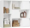A white bookshelf with various items on its shelves. Produktbild-Vorschau