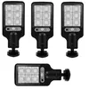 Four black LED solar lamps with motion sensor, arranged in a collage. Produktbild-Vorschau