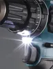 Close-up of a power drill's chuck and trigger area, with its LED light illuminated. Produktbild-Vorschau