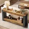 A console table with decorative items placed on it, in a living room setting. Anteprima dell’immagine prodotto