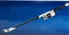 A white and black cordless vacuum cleaner is displayed against a blue background. Produktbild-Vorschau