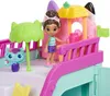 A doll and a cat toy are on a colorful playset. Anteprima dell’immagine prodotto
