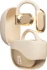 A pair of cream and gold wireless earbuds with their charging case, which displays a digital battery indicator. Náhľad obrázku produktu