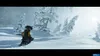 A person on a snowmobile in a snowy landscape. Produktbild-Vorschau