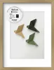A wooden picture frame with a white mat and three origami birds inside. Voir les images du produit