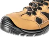 A close-up view of the toe and laces of a work boot. Voir les images du produit
