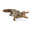 A realistic toy crocodile with its mouth open, shown from a side-angle on a white background. Anteprima dell’immagine prodotto