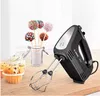 A black Bosch hand mixer is shown on a wooden surface with cupcakes and cake pops in the background. Anteprima dell’immagine prodotto