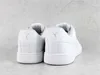 The back view of a pair of white Puma sneakers on a light gray textured background. Produktbild-Vorschau