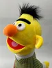A close-up profile view of a Bert from Sesame Street plush toy. Produktbild-Vorschau