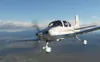 A white airplane flying in the sky over mountains. Anteprima dell’immagine prodotto