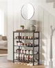 A shoe rack with shoes on it, next to a staircase and a mirror. Produktbild-Vorschau
