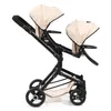 A side view of a twin doll stroller against a white background. Produktbild-Vorschau