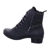 A side view of a black boot with a plaid shaft. Voir les images du produit