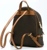 A Michael Kors backpack shown from the back and side. Anteprima dell’immagine prodotto