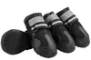 A set of four black dog boots with reflective straps, arranged diagonally on a white background. One boot is shown sole-up on the left. Produktbild-Vorschau