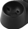 A close-up view of a black charging dock for game controllers. Produktbild-Vorschau
