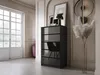 A modern dresser in a well-lit room with a large window and decorative elements. Anteprima dell’immagine prodotto