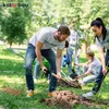 People planting trees in a park. Produktbild-Vorschau