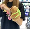 Kapibara Kuscheltier mit Rucksack – Plüschtier Armband mit Produktbild-Vorschau 4