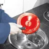 A person is using a drain cleaning tool in a sink. Produktbild-Vorschau