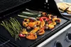 Vegetables being grilled on a BBQ grill mat. Produktbild-Vorschau