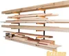A storage rack system for wood, filled with various pieces of lumber. Náhled obrázku produktu