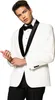 A man wearing a white tuxedo with black lapels and a black bow tie, posing for a product shot. Produktbild-Vorschau
