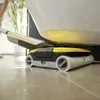 A floor cleaner is being used under a toilet. Produktbild-Vorschau