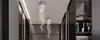 A hallway with two crystal pendant lights hanging from the ceiling. Produktbild-Vorschau