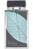 A perfume bottle with a leaf design. Voir les images du produit