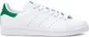 A white Adidas Stan Smith sneaker with green accents. Náhled obrázku produktu
