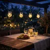 DOCHTMANN Lot de 4 lanternes solaires transparentes de 9 cm Voir les images du produit 4
