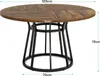 A round dining table with a wooden top and a black metal base, shown with dimensions indicated. Náhľad obrázku produktu