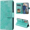 Collage of a teal mandala-embossed flip phone case for a Samsung Galaxy A54 5G, showing its front, interior with card slots and photo frame, and its stand-up function. Produktbild-Vorschau