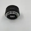 A close-up view of the rear of a camera lens, showing the mount and some text. Náhľad obrázku produktu