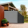 A modern outdoor living space featuring a WPC fence, wooden deck, and potted plants. Produktbild-Vorschau